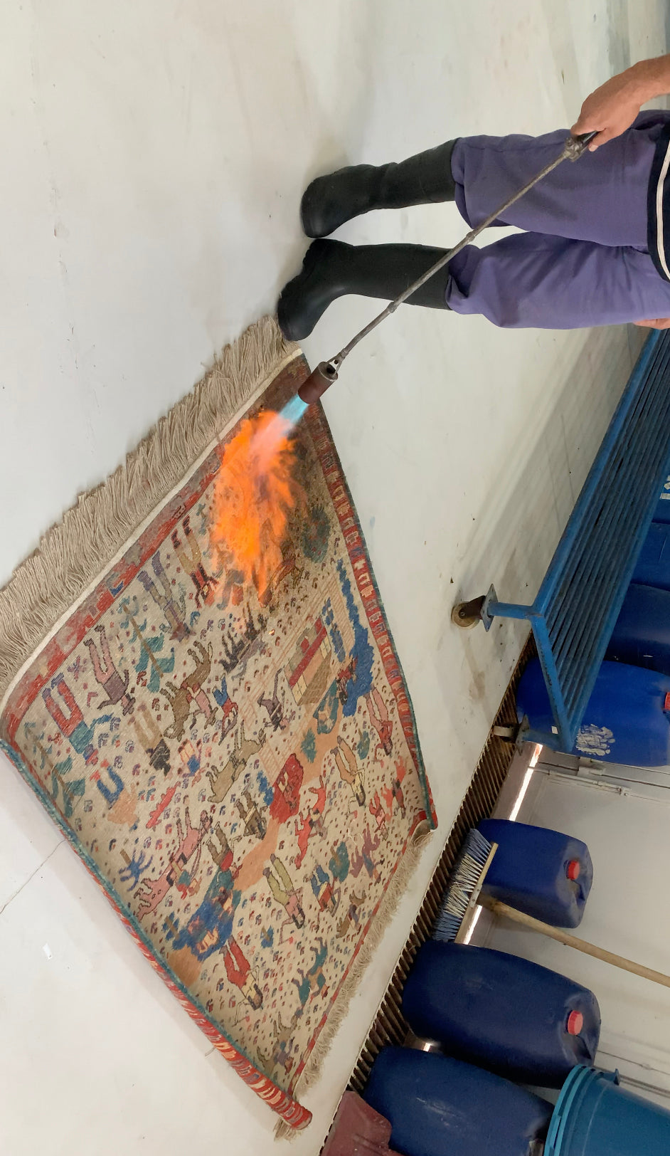 Burning process on the back of the rug